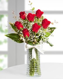 Cam vazoda 7 adet kırmızı gül  Uşak çiçek , çiçekçi , çiçekçilik 
